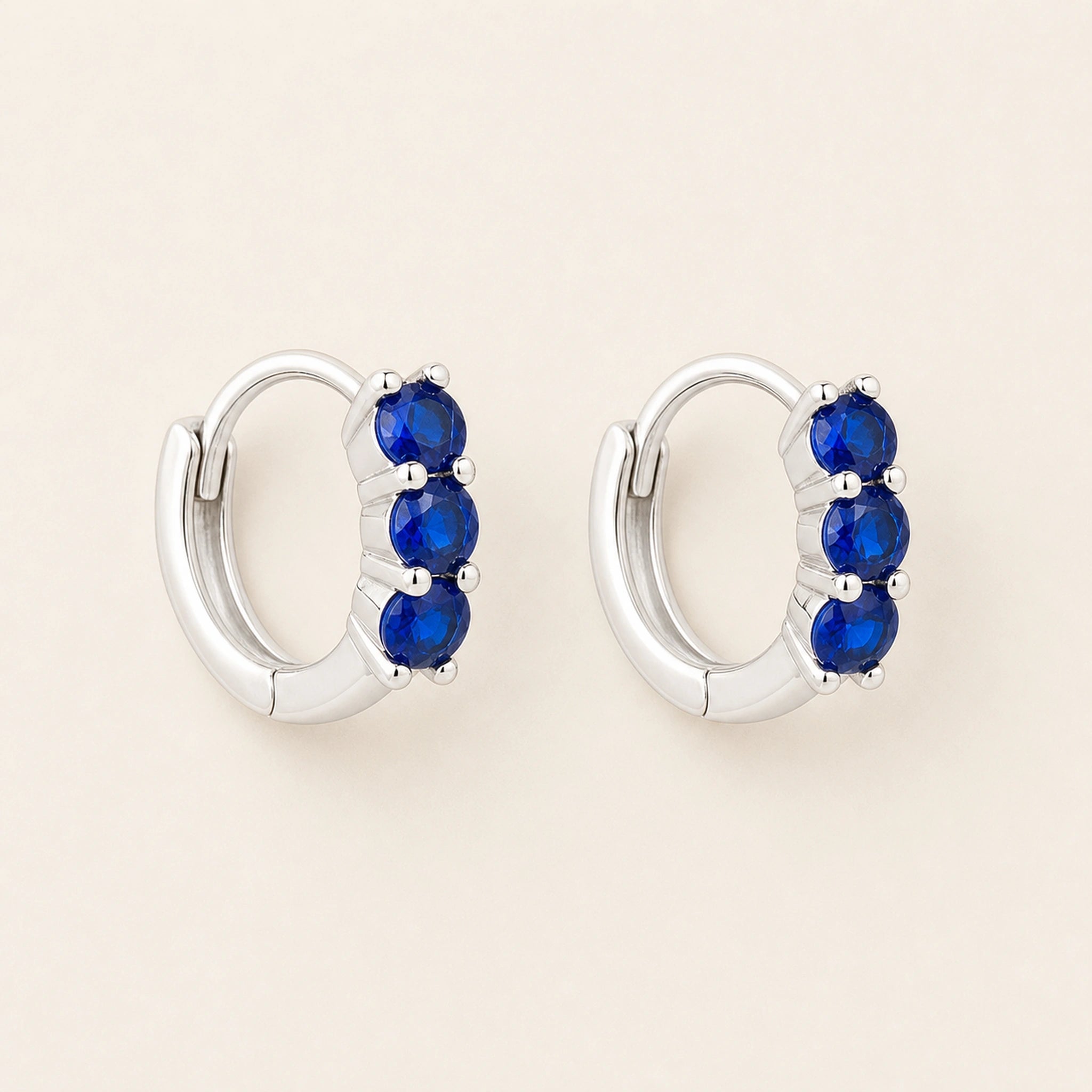 Celeste Blue Zircon Huggie Earrings – Sterling Silver