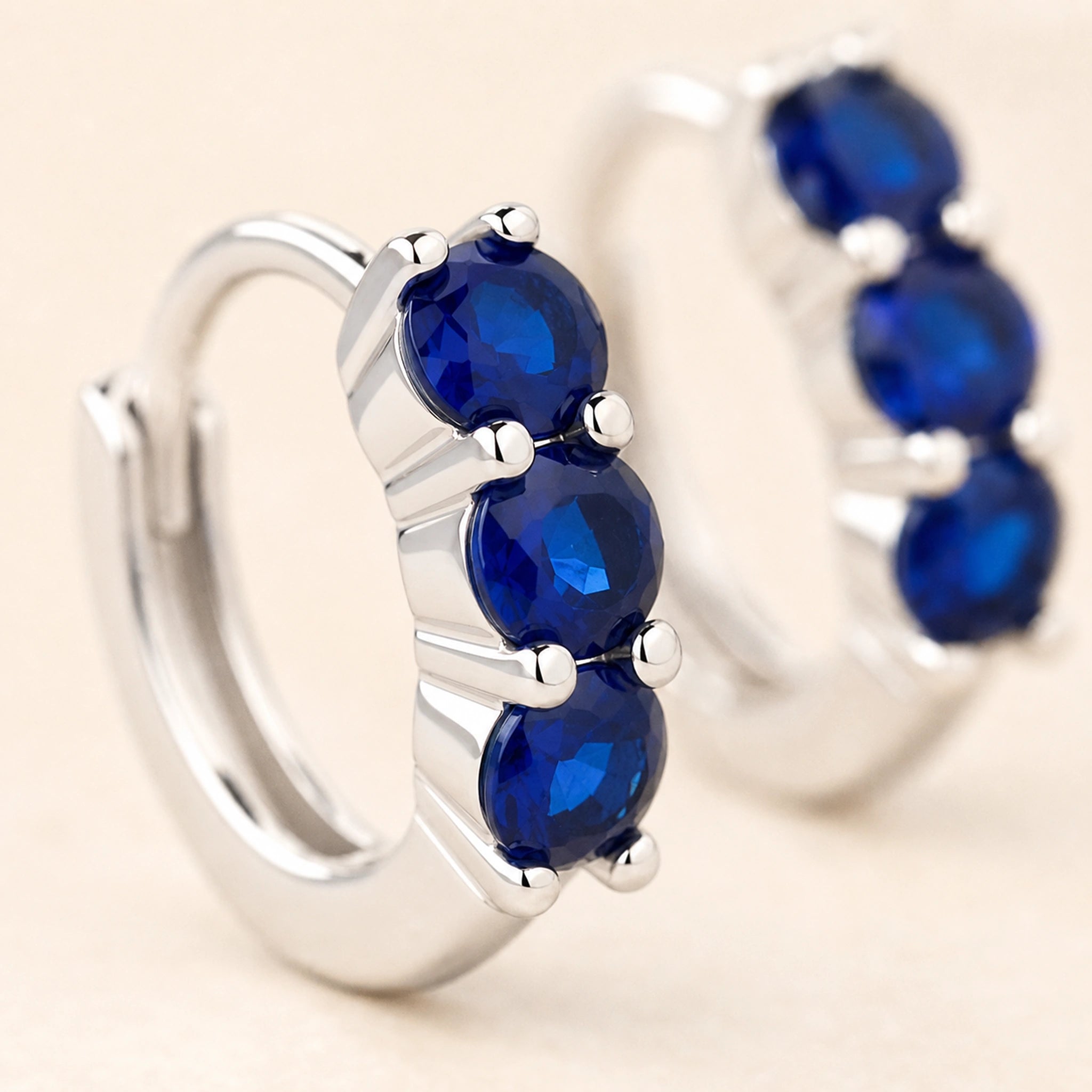 Celeste Blue Zircon Huggie Earrings – Sterling Silver