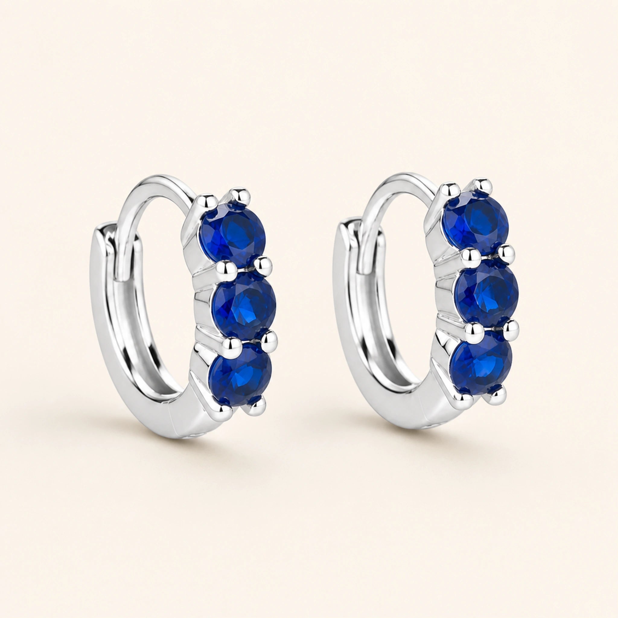 Celeste Blue Zircon Huggie Earrings – Sterling Silver